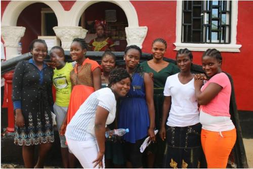 Marie Clarke and a some members of Rural Women Initiative in Gbarpolu 