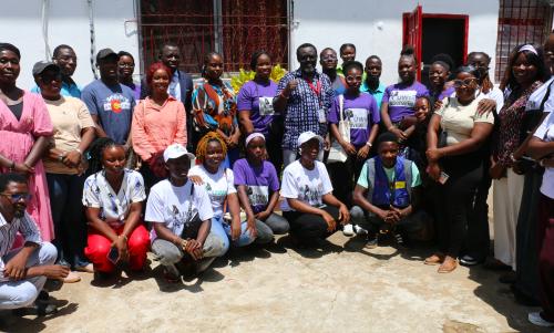 Secretary general pose with Liberian youth after a meeting