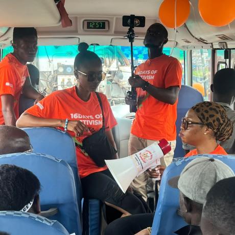 Inside Mobile Cafe. Young people discuss issues of the day during the free ride session.