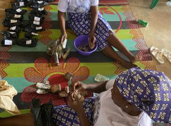 Todee women distribute VSLA Cash